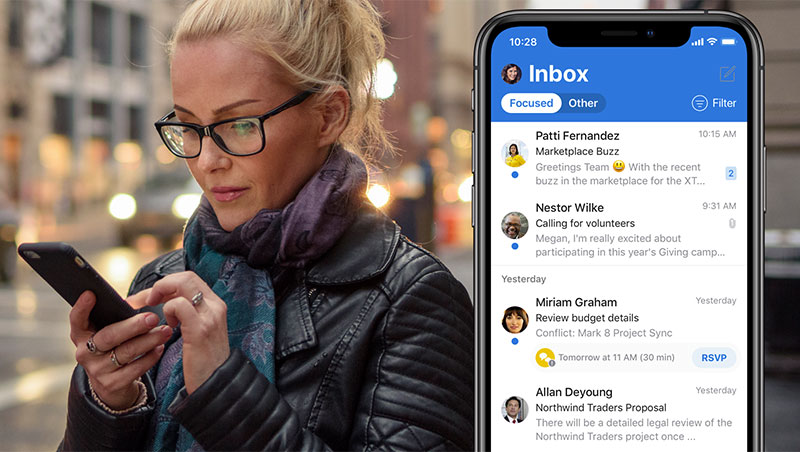 Woman using email on cell phone