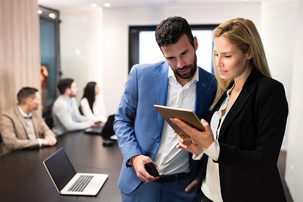Office Workers Using Tablet